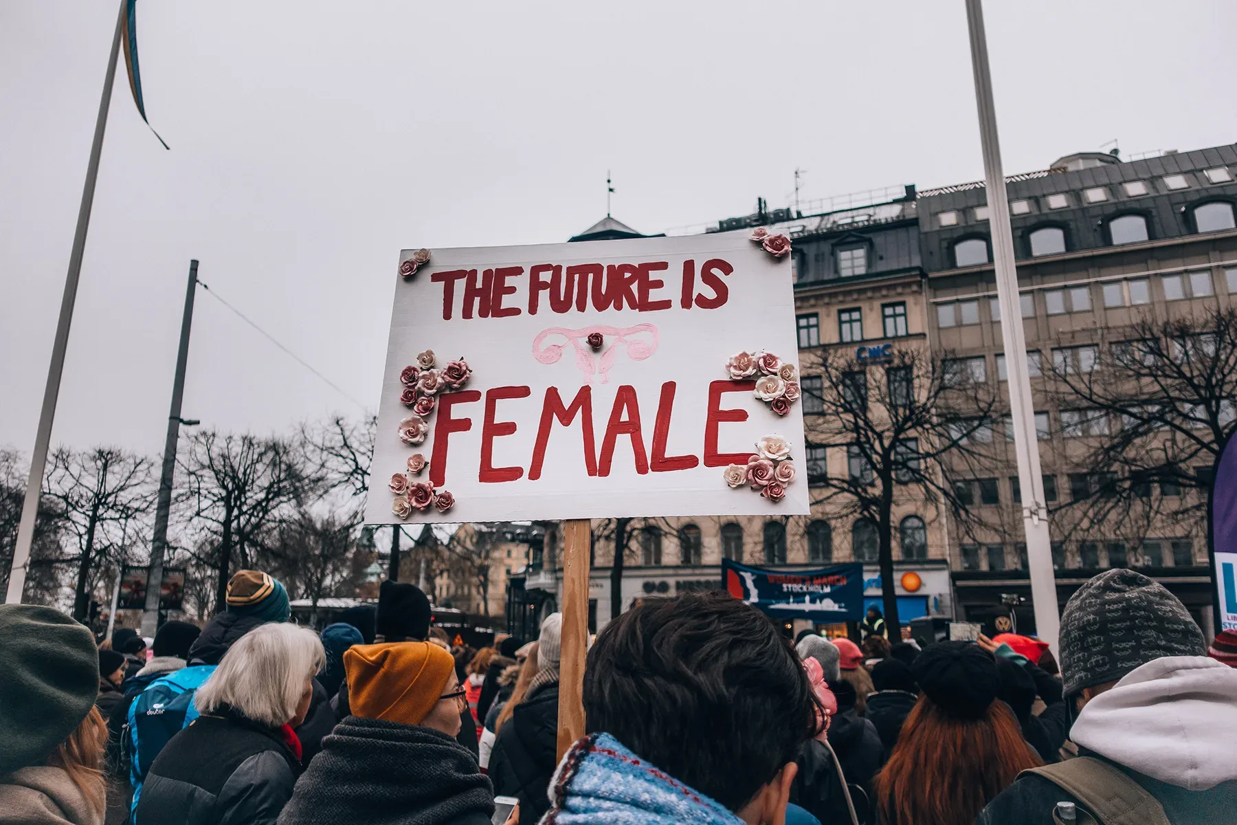 A group of Scandinavian women holding a sign that says the future is female.