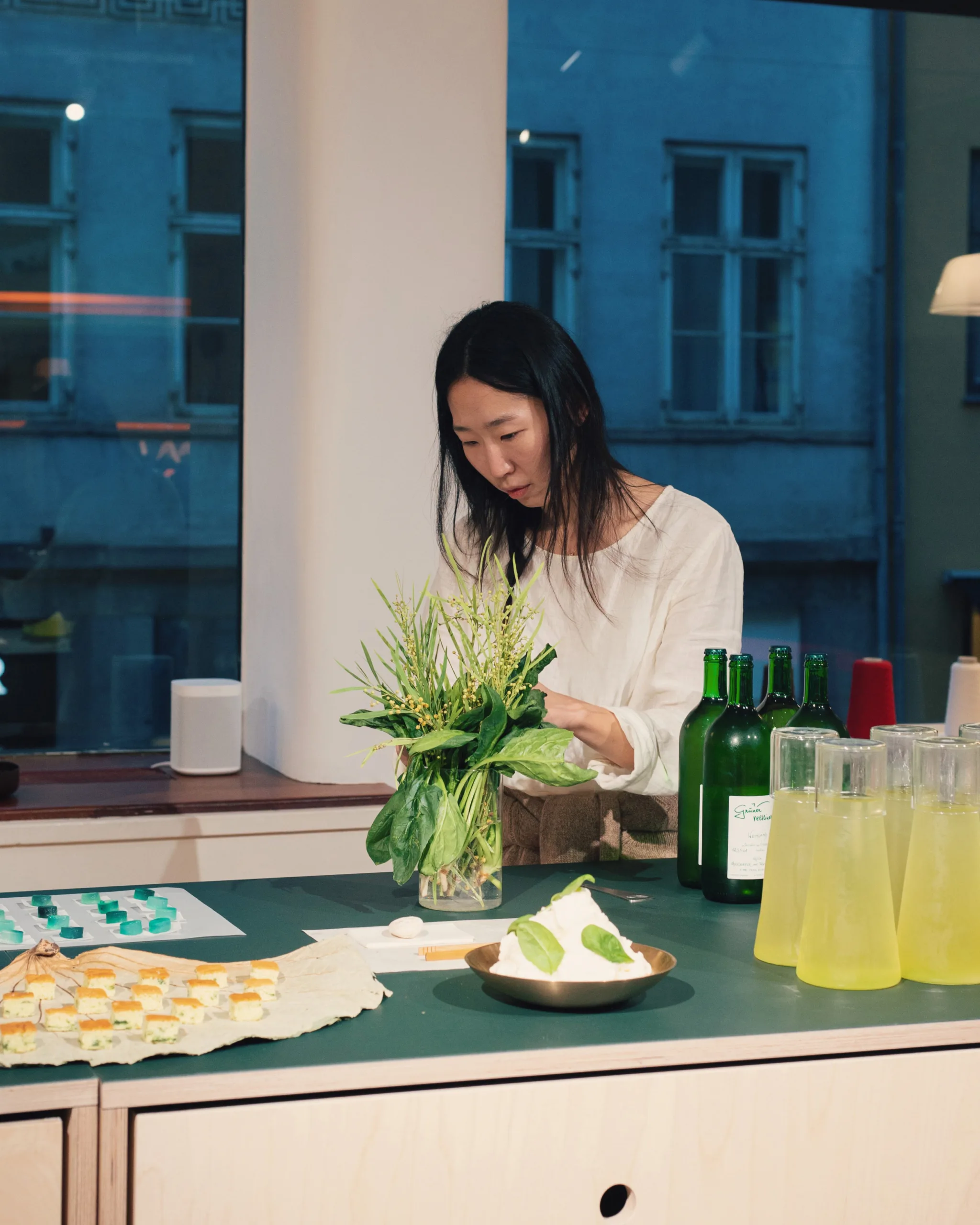 Sun Eun is preparing food for a party in Denmark.